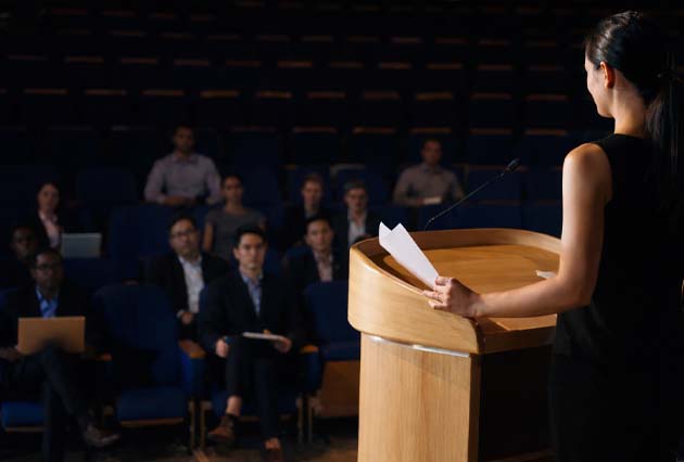 A speaker addressing an audience